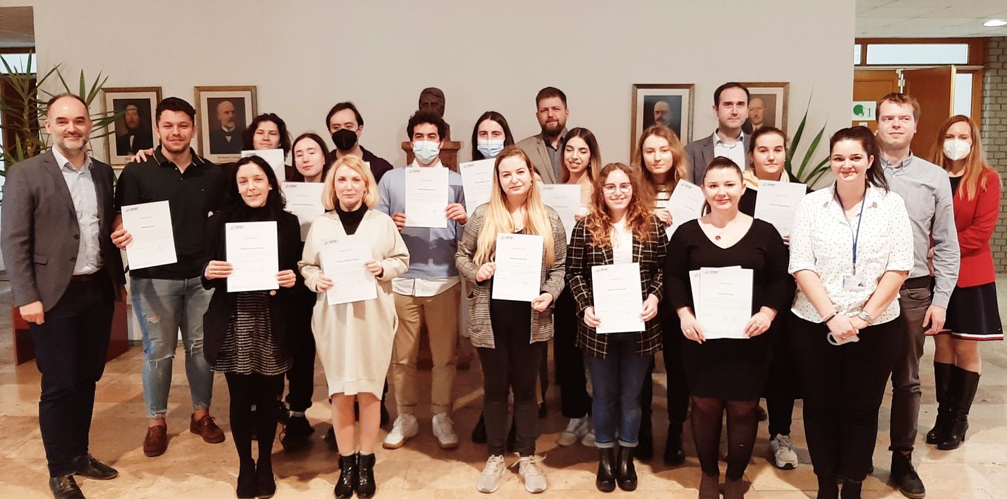 Winter Seminar participants with their certificates of completion in 2022.